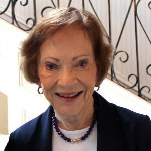 Rosalynn Carter in front of staircase